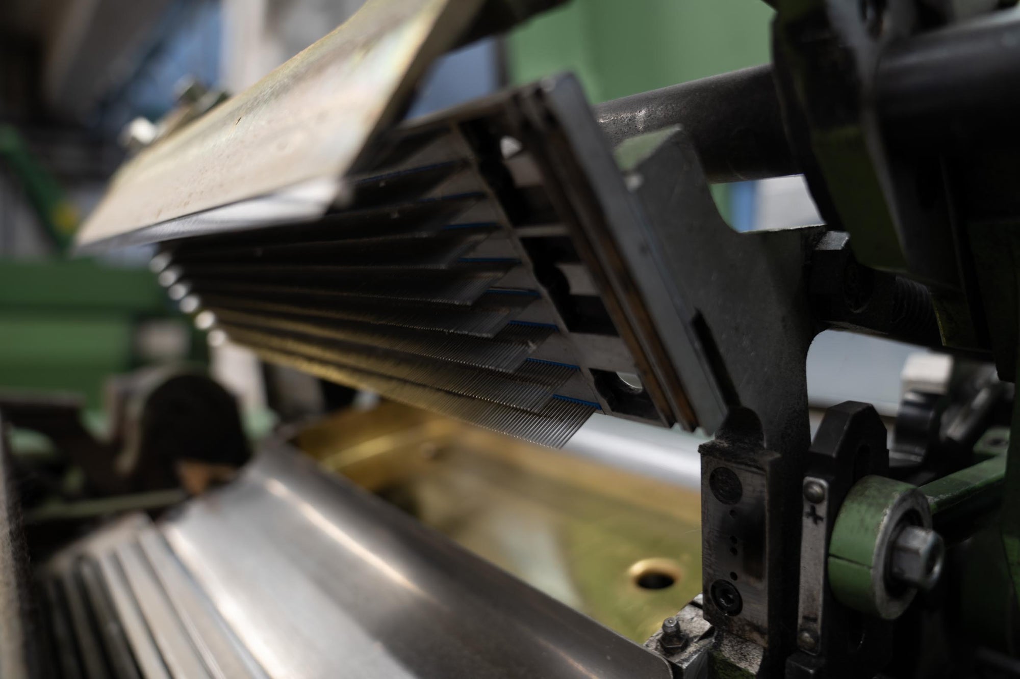 A close-up shot of a tops combing machine at the ARA spinning facility.