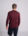 Model wearing Merino Featherweight Sweater Bourdeaux Back View