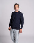 Model wearing Merino Featherweight Sweater Navy Front View