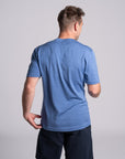 Model wearing Merino Featherweight T-shirt Sky Blue Back View