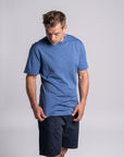 Model wearing Merino Featherweight T-shirt Sky Blue Front View