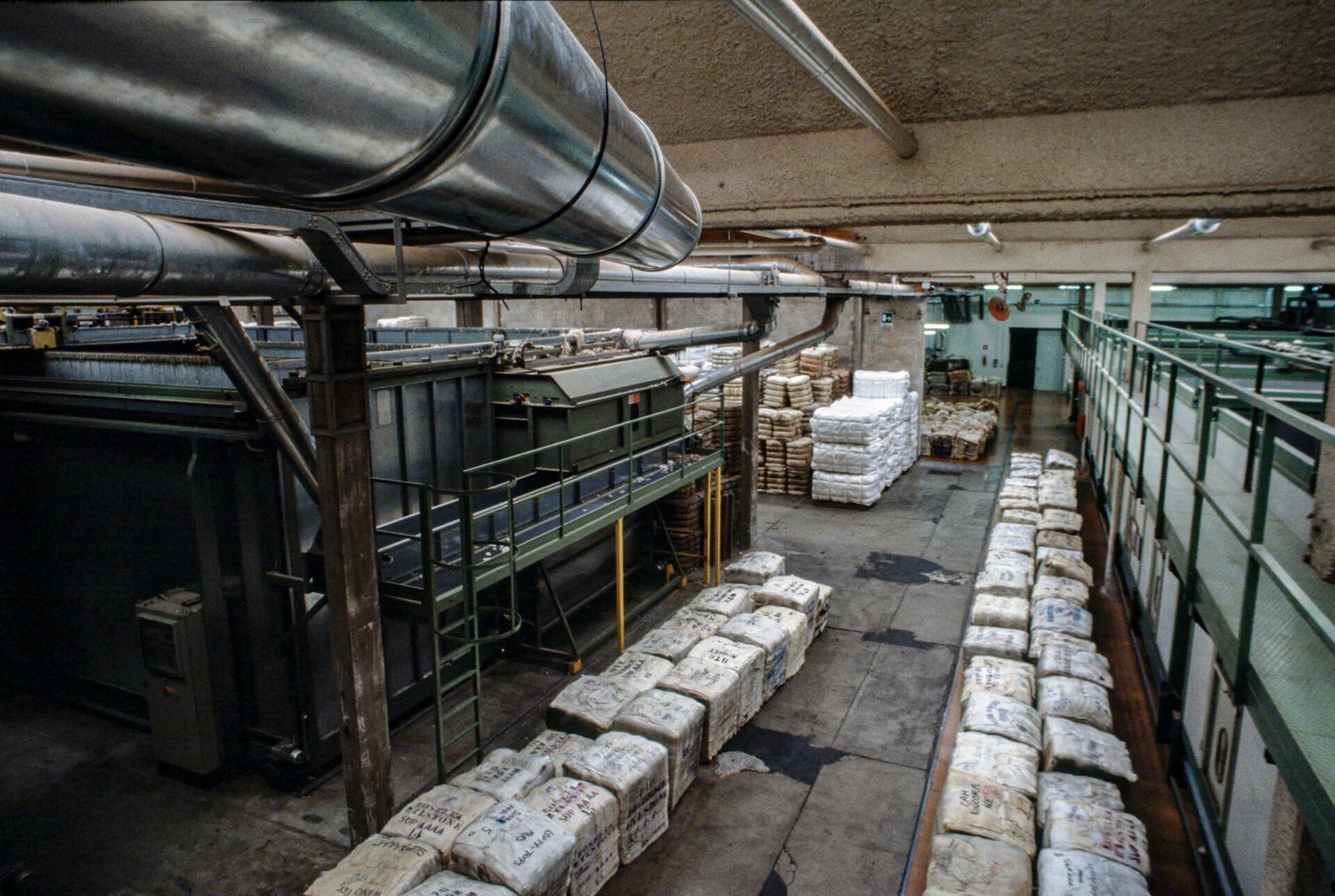 Wide shot of a warehouse storage of wool bales