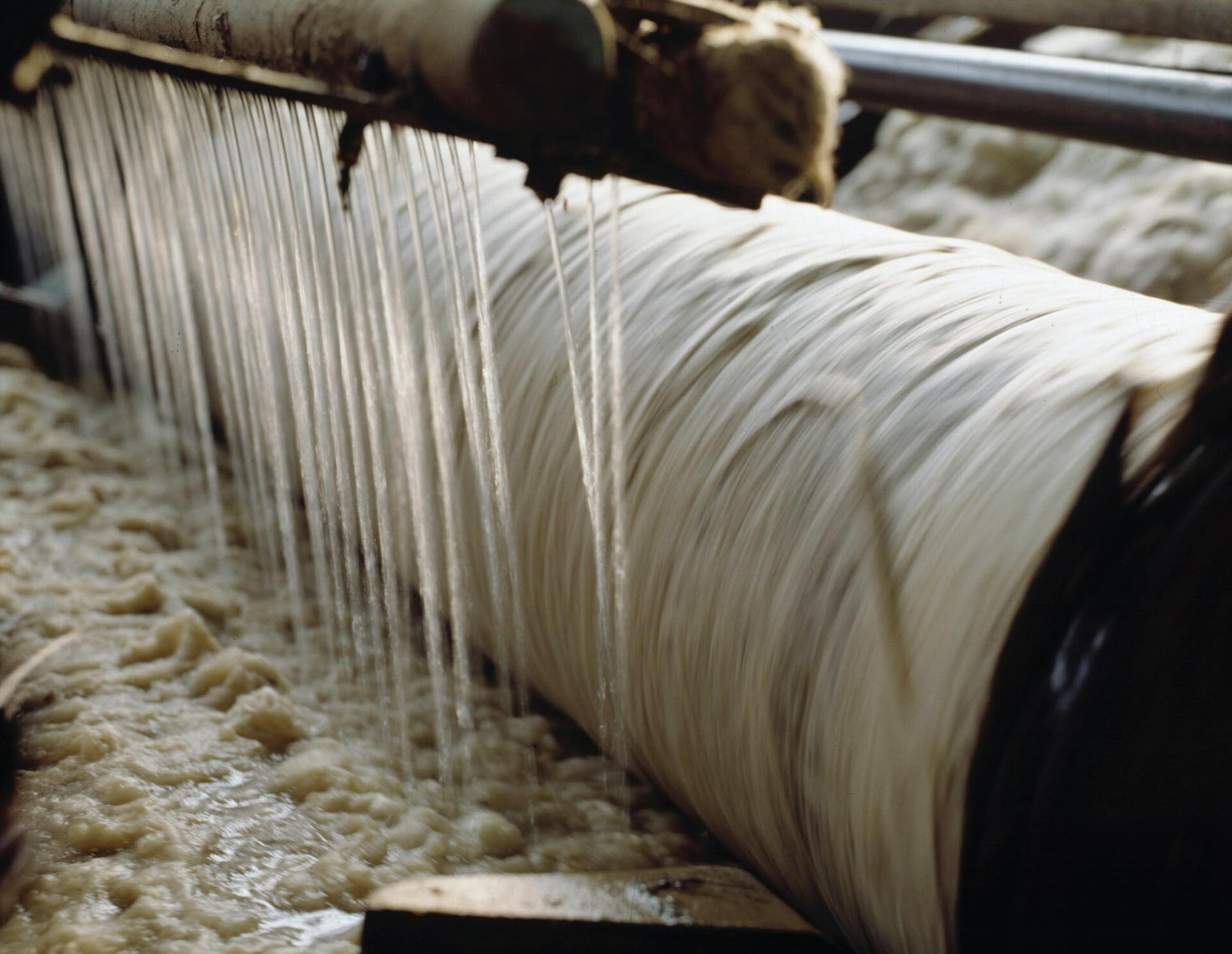 Scouring or washing of raw Merino wool or sucida.