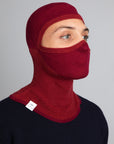 Model wearing The Merino Balaclava Brick Red from Unborn