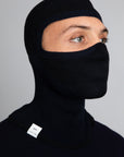 Front view model wearing the Merino Balaclava in Navy
