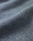 The Merino wool jaquard sweater Navy Grey, close up fabric - Unborn