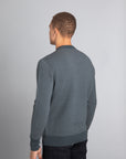 Model Wearing The Merino wool jaquard sweater Navy Grey, back - Unborn