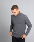 Model Wearing The Merino Wool Roll Neck Grey, front - Unborn