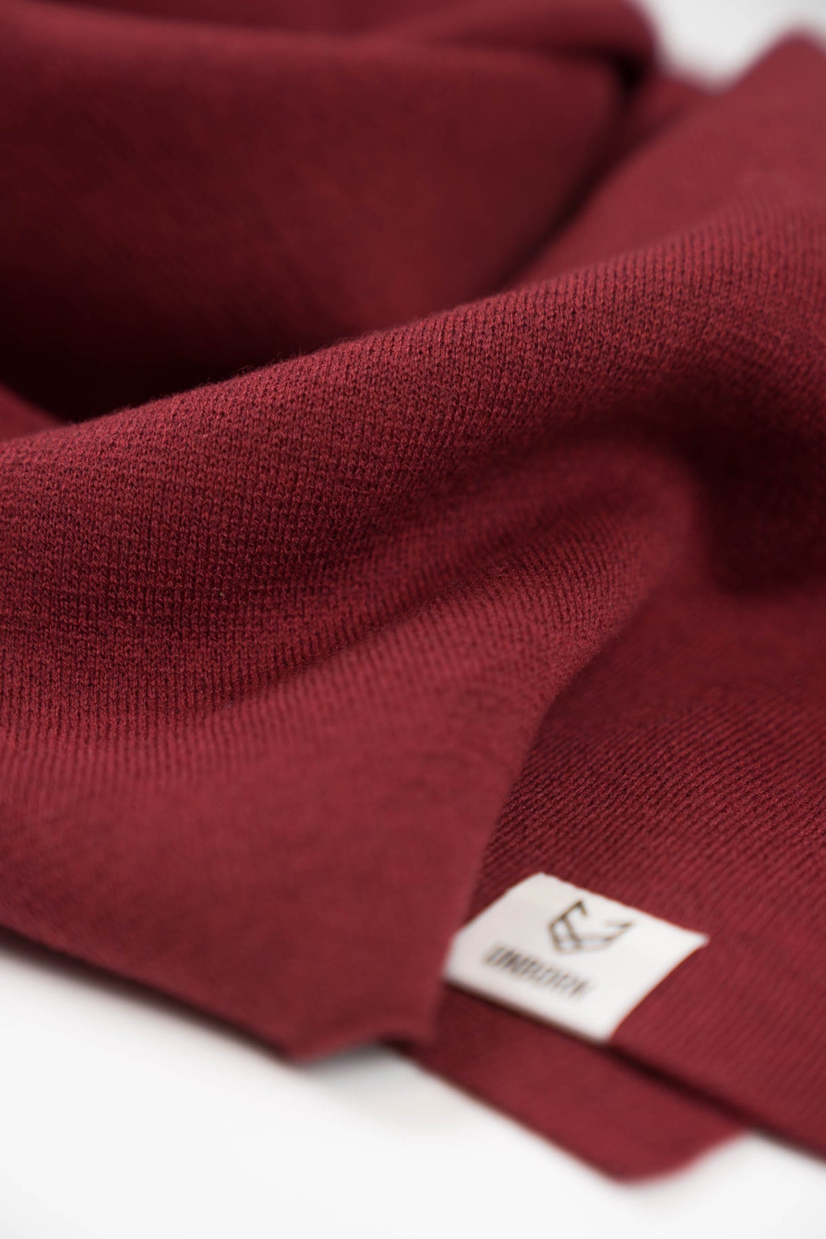 The Merino Wool Square Scarf Brick Red, close up fabric - Unborn