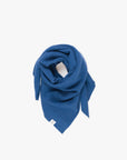 The Merino Wool Square Scarf Sky Blue, wrapped flat - Unborn