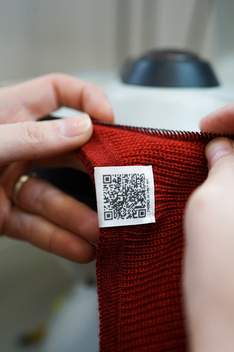 Close up of The Merino Balaclava with QR code showing