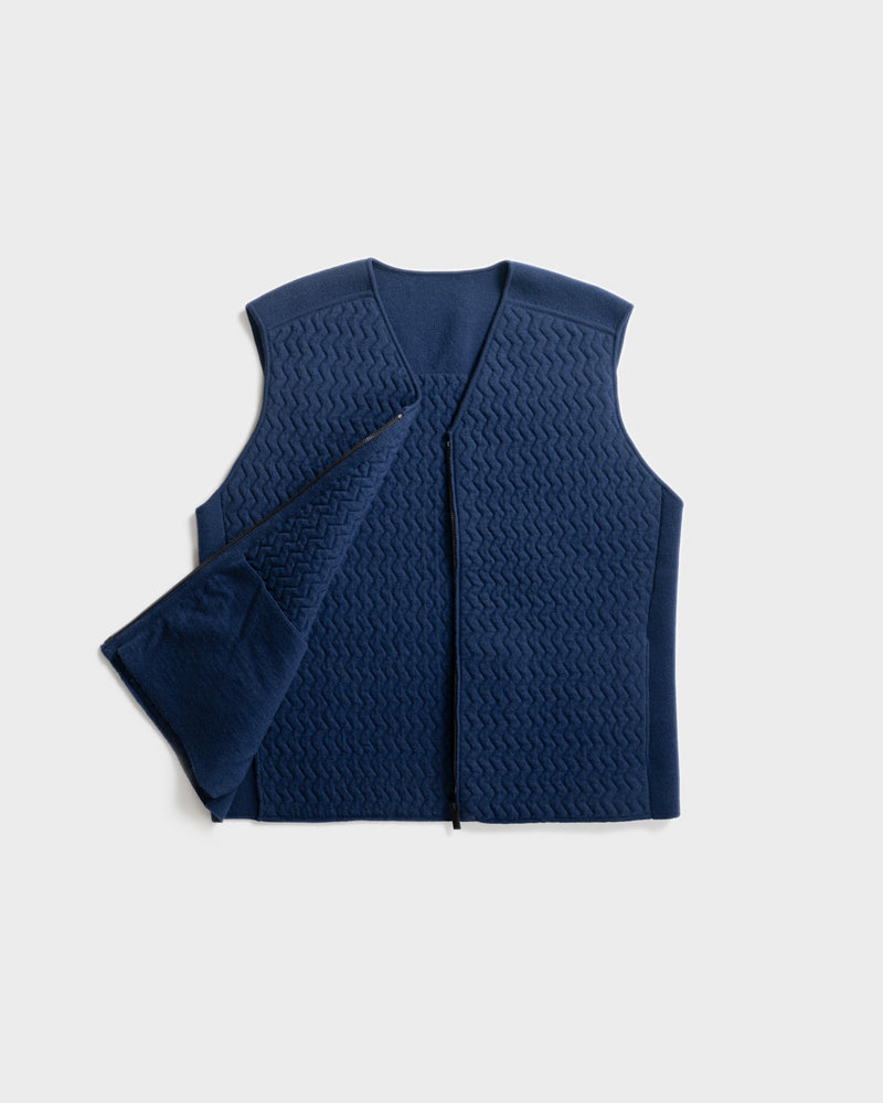 Merino d'Arles Padded vest in medieval blue flat lay front view