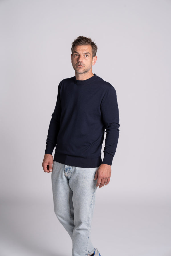 Model wearing Merino Featherweight Sweater Navy Front View