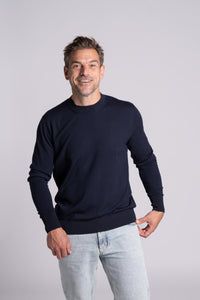 Model wearing Merino Featherweight Sweater Navy Front View