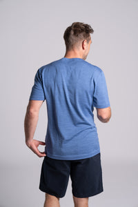 Model wearing Merino Featherweight T-shirt Sky Blue Back View
