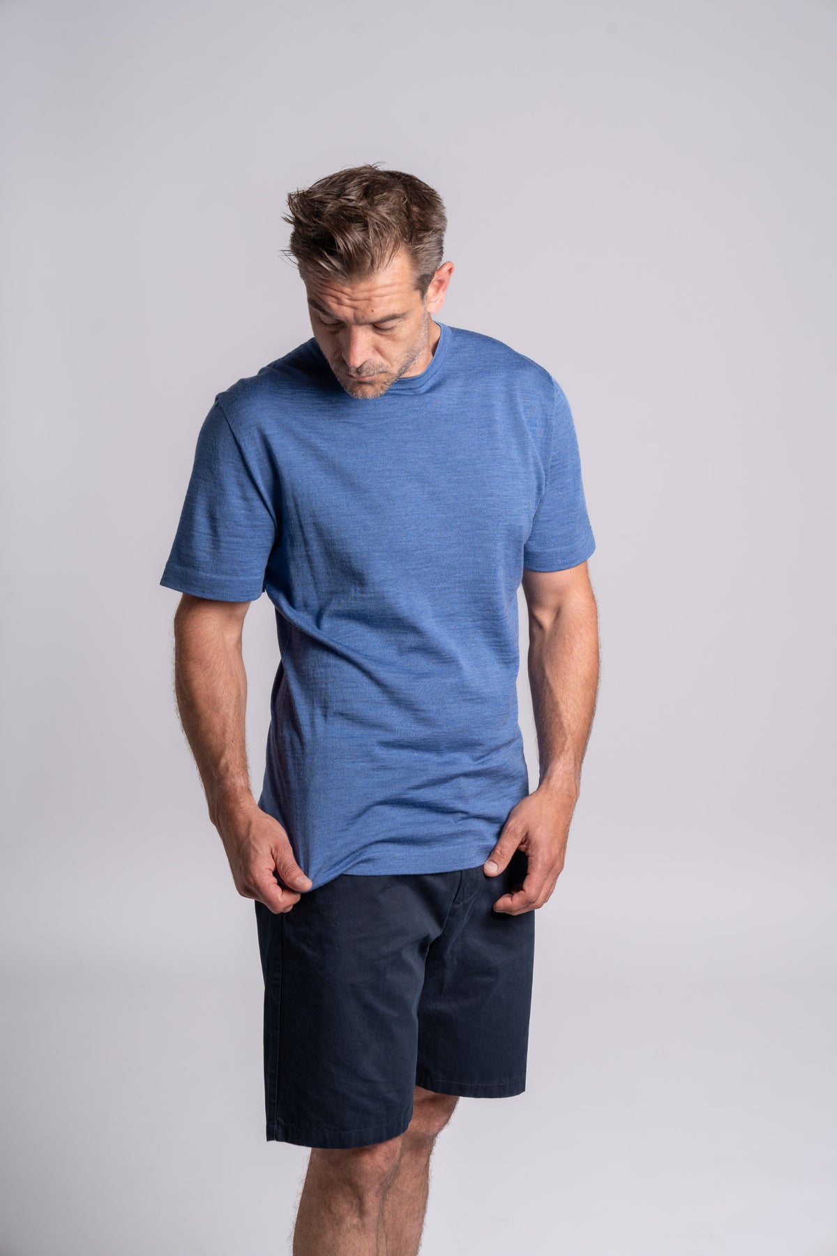 Model wearing Merino Featherweight T-shirt Sky Blue Front View