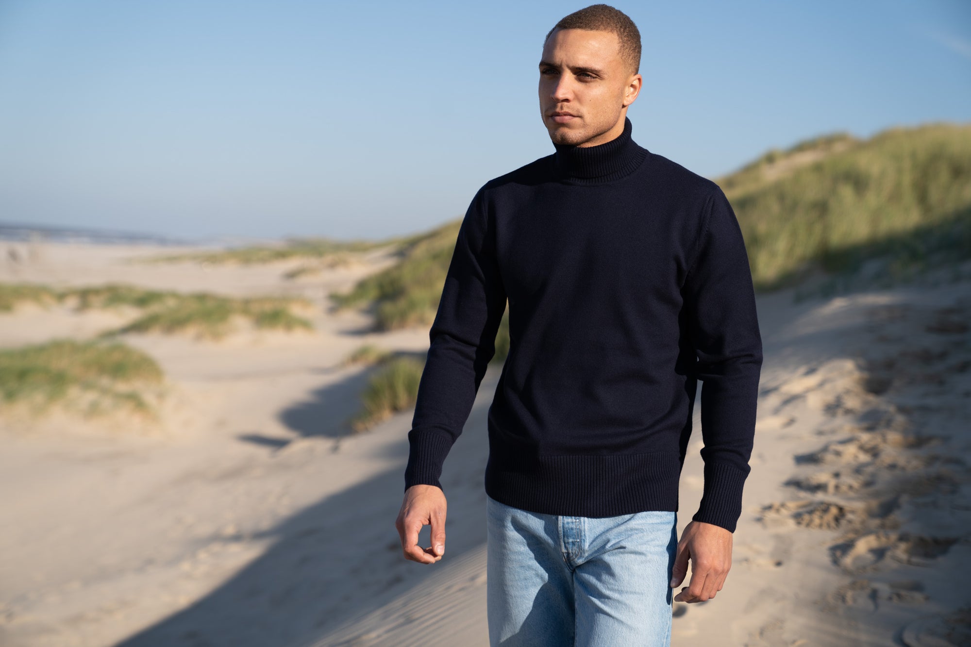 Model Wearing Heavy Merino Roll Neck Navy Beach