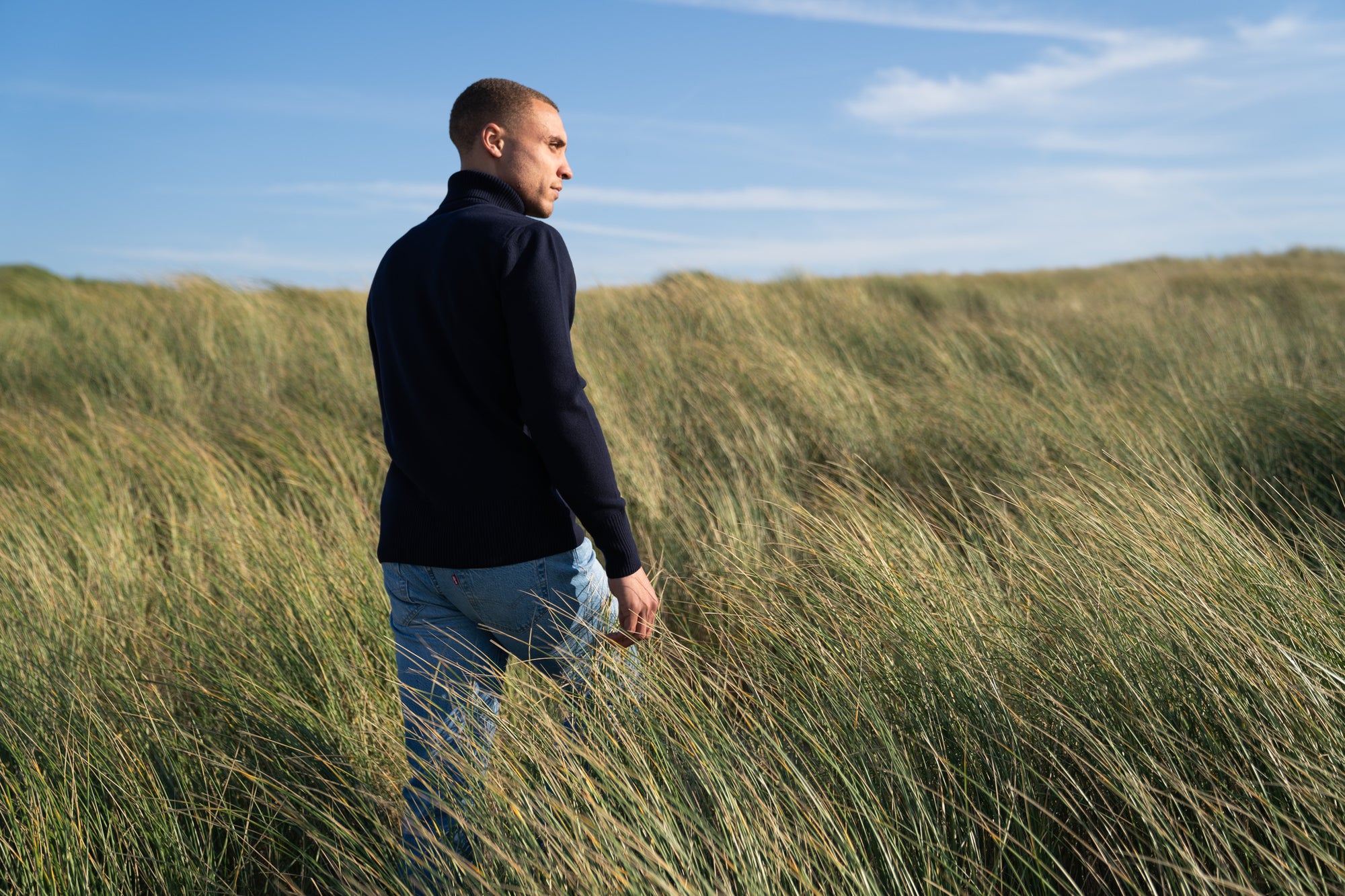 Model Wearing Heavy Merino Roll Neck Navy Dunes