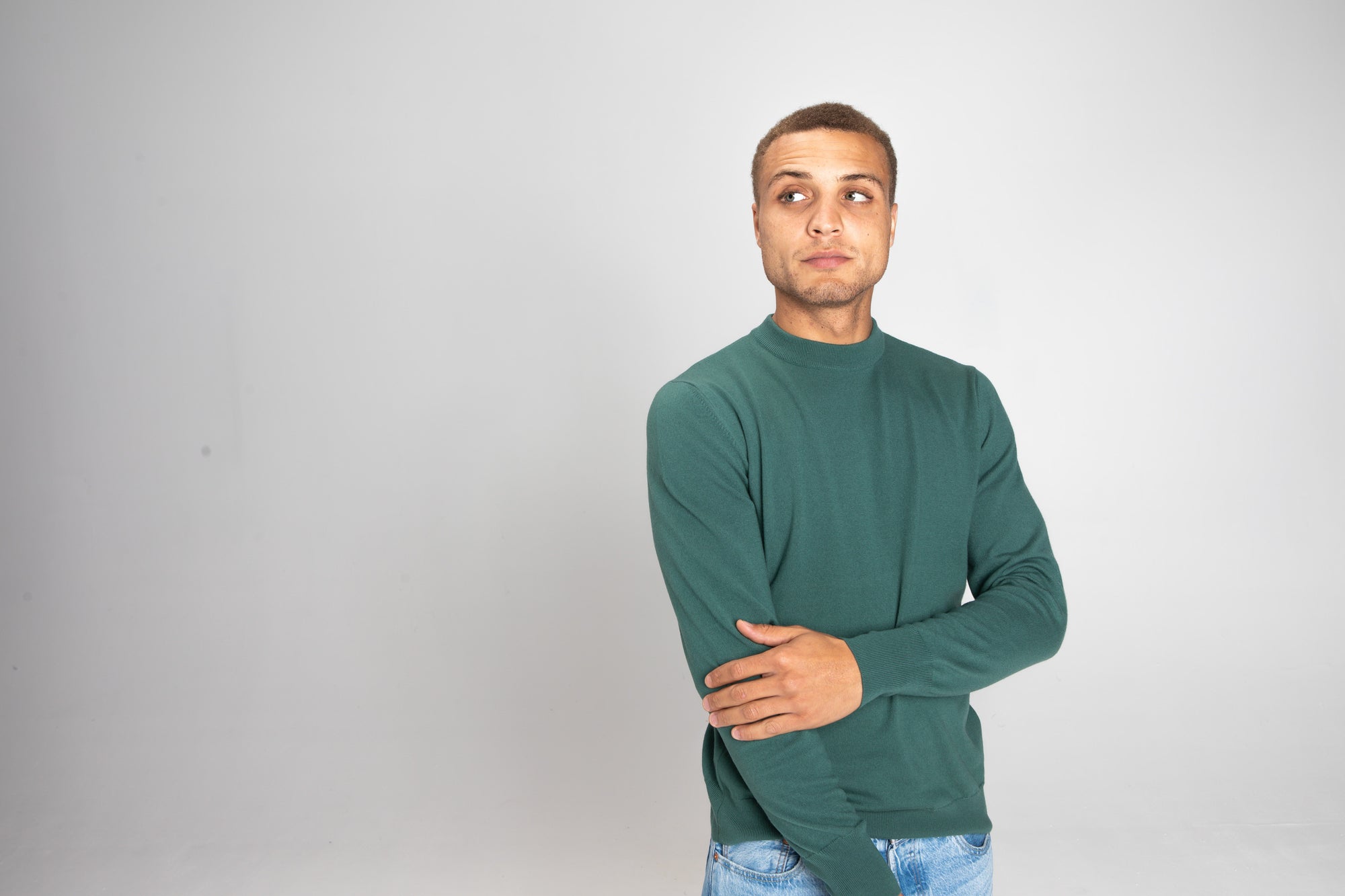 Model Wearing Light Merino Sweater Foggy Green