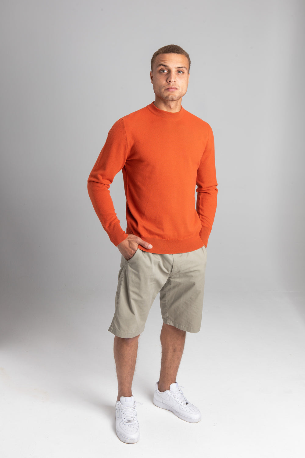 Model Wearing Light Merino Sweater Orange