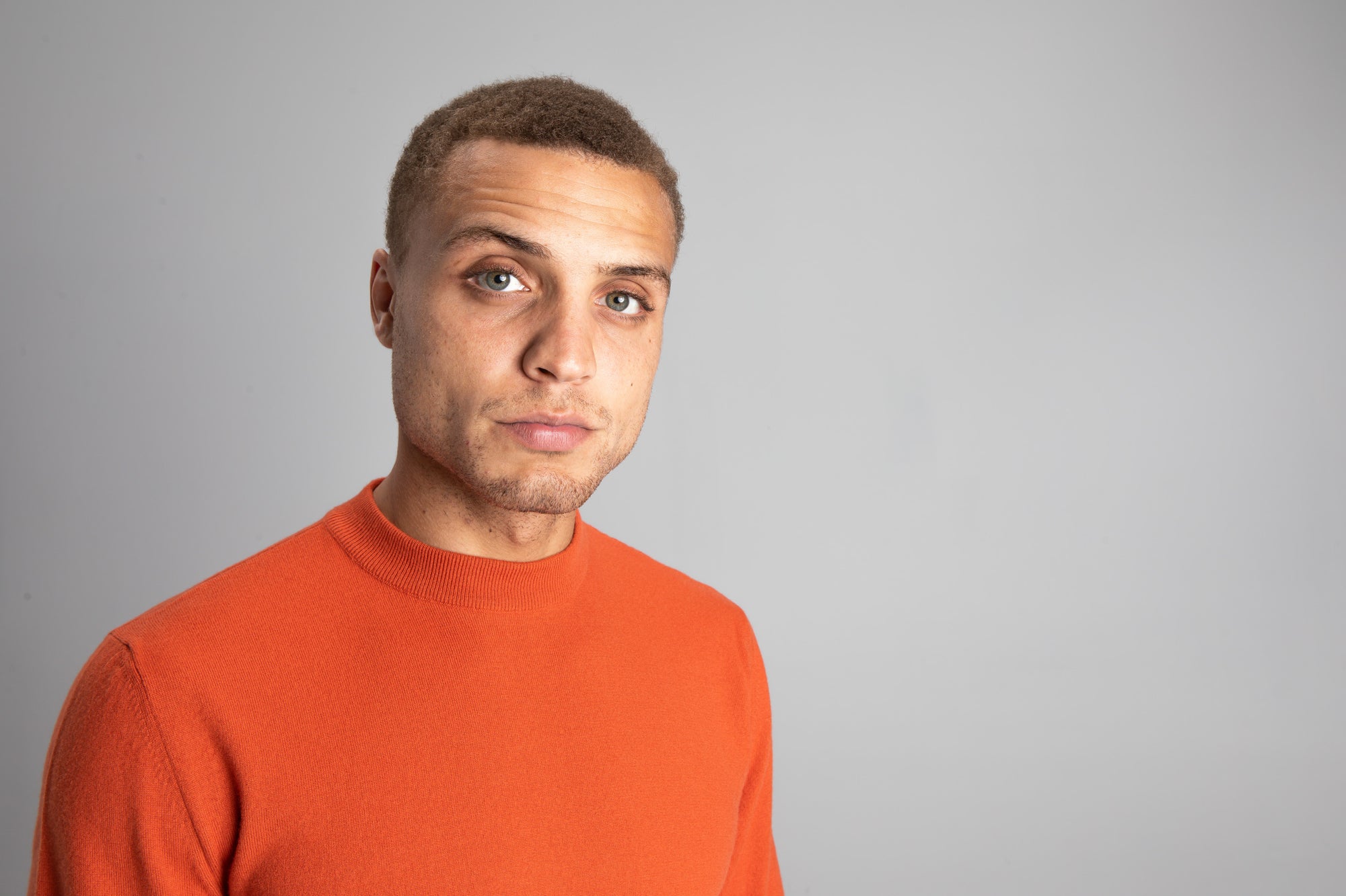 Model Wearing Light Merino Sweater Orange Studio