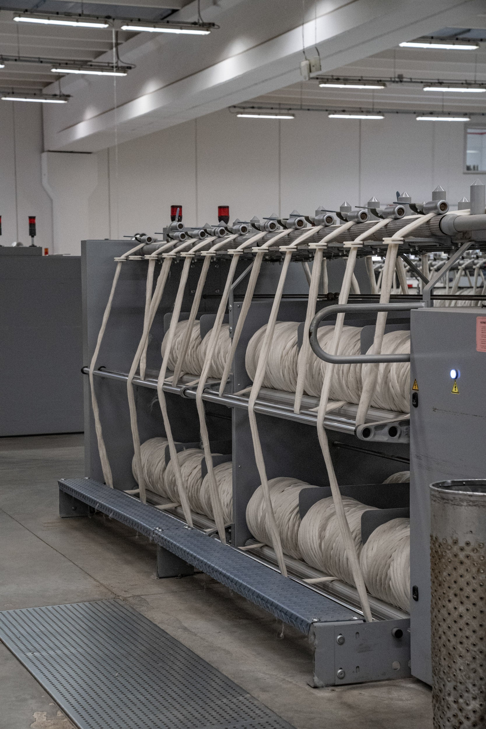 Combed Merino wool being spun into bump tops at Romagnano sesia