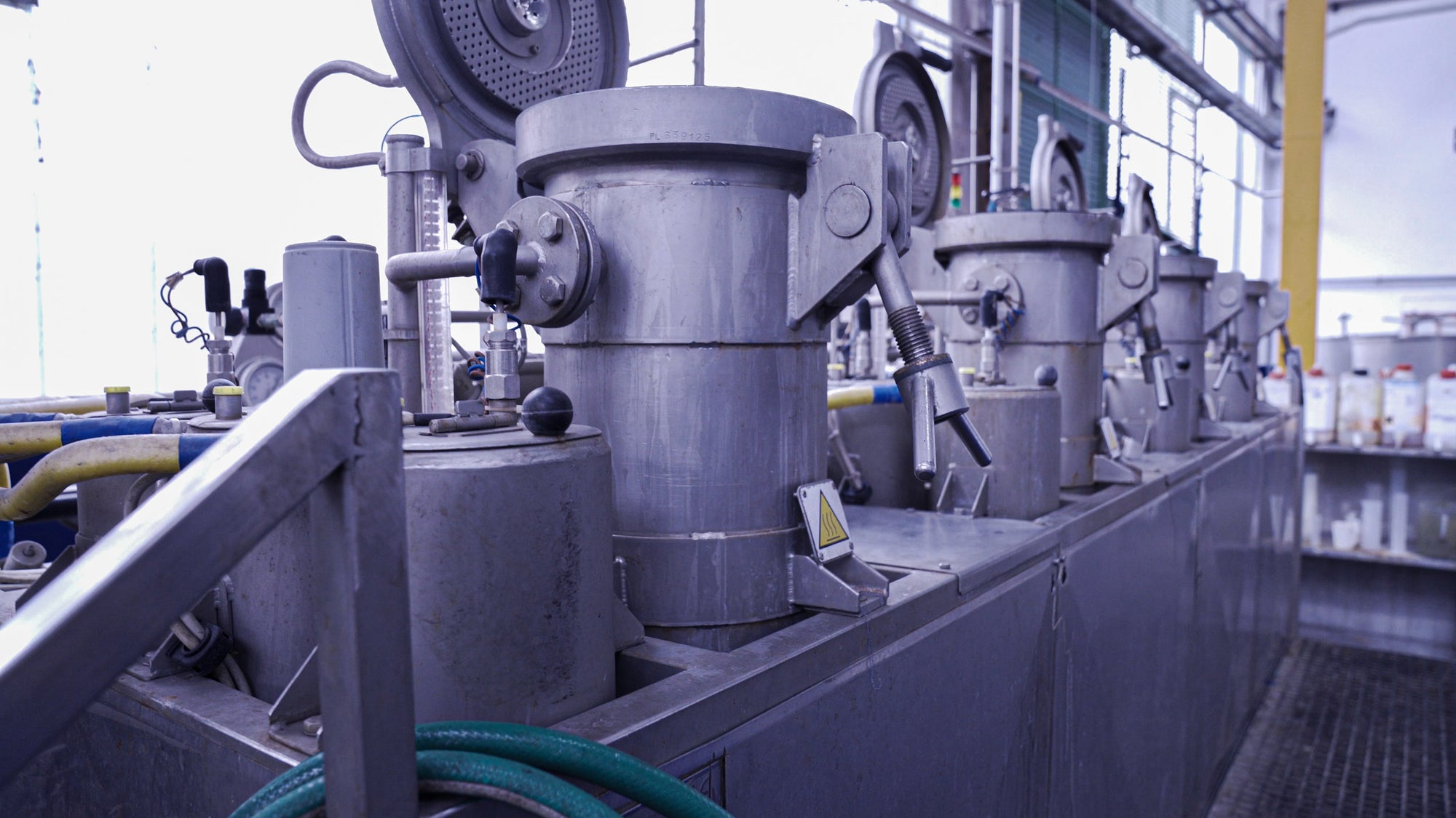 Group of small industrial dying kettles at dying facility in Valle Mosso
