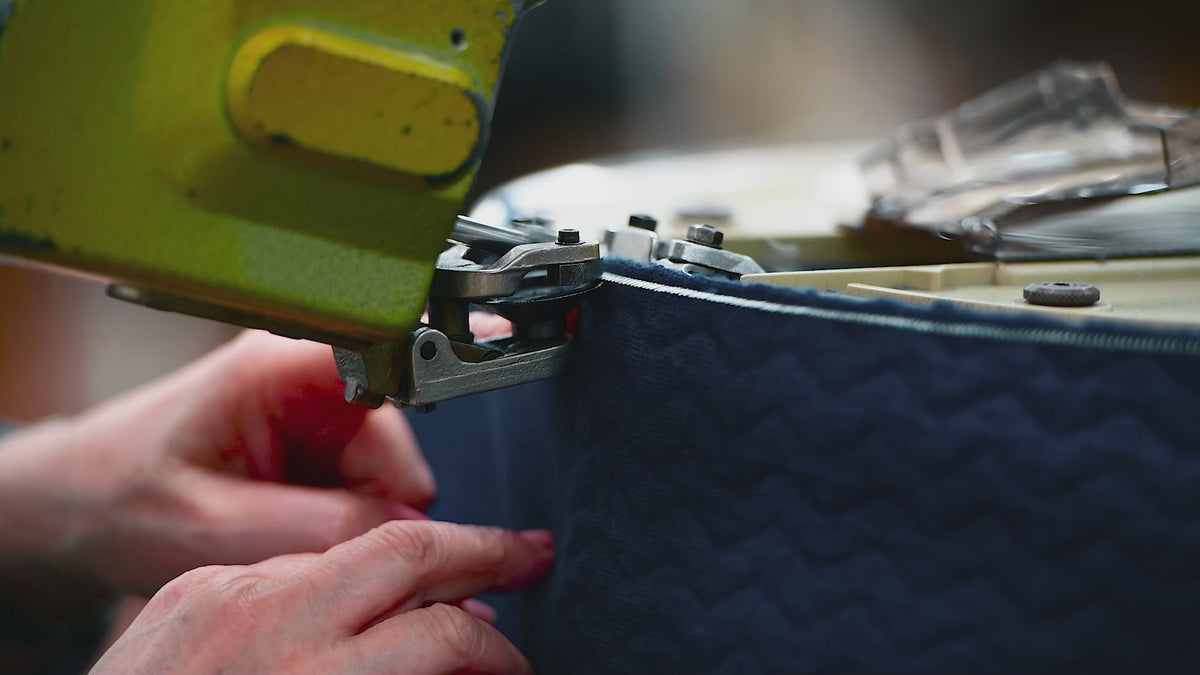 a short movie showing steps of the knitwear production from the Merino d'Arles padded vest