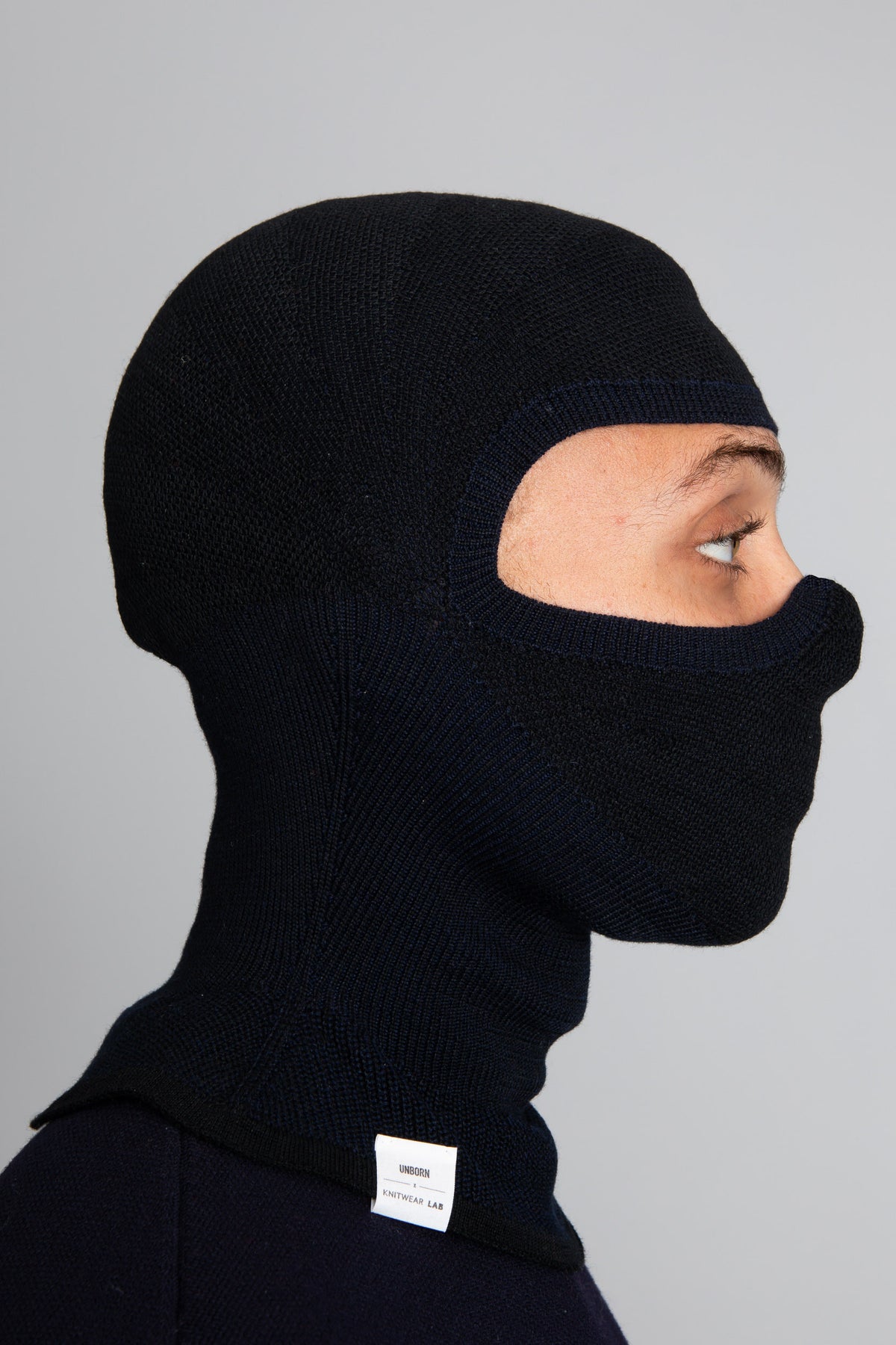 Model wearing The Merino Balaclava Navy