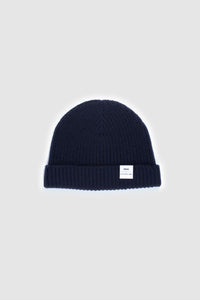 The Merino wool beanie Dark Navy, flat front view Unborn