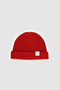 The Merino wool beanie  poppy red, flat front view Unborn