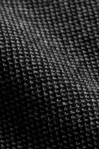 The Merino wool jaquard sweater Black Grey, close up fabric - Unborn