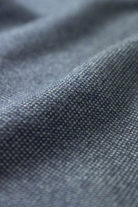 The Merino wool jaquard sweater Navy Grey, close up fabric - Unborn