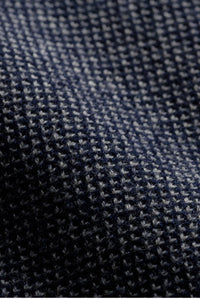 The Merino wool jaquard sweater Dark Navy Grey, close up fabric - Unborn