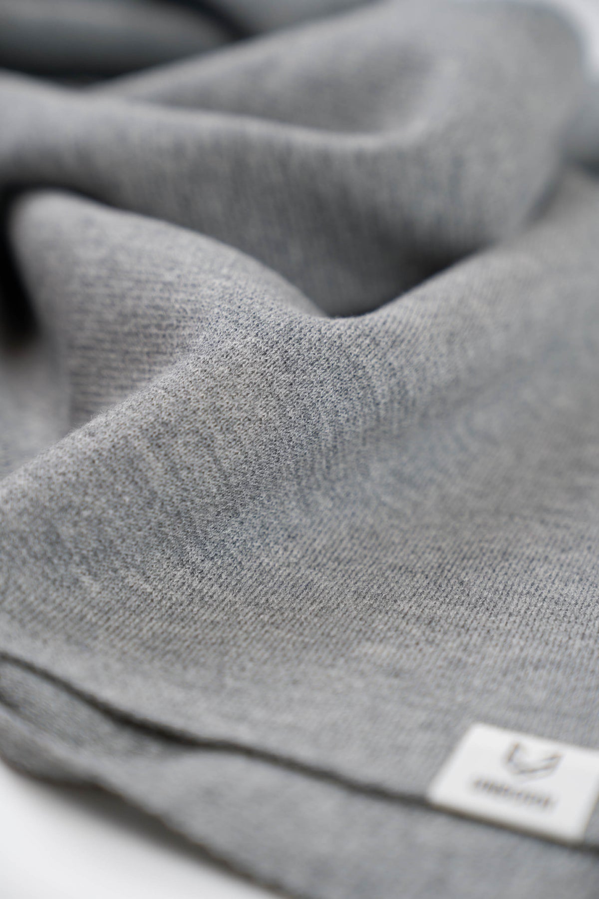 The Merino Wool Square Scarf Grey melange, close up fabric - Unborn