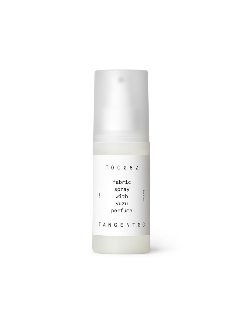 A 100ml closed bottle of Tangent Yuzu Organic Fabric Spray 100ml